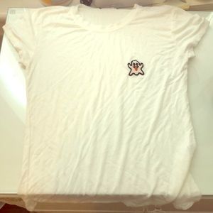 White Brandy Melville shirt.